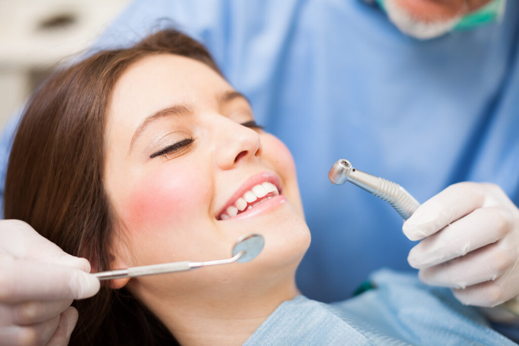 Woman getting Dental Cleaning in Forney at TOOTH Dental Cleanings Forney