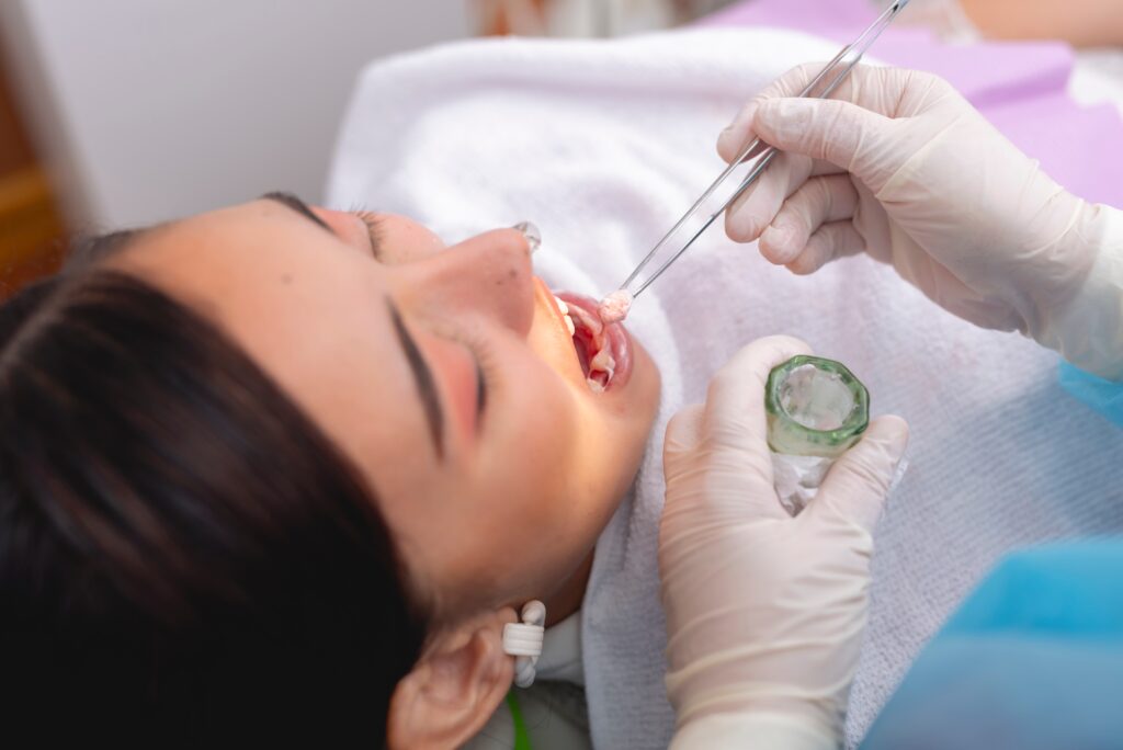 Patient getting Fluoride Treatment in Forney at TOOTH Fluoride Treatment Forney